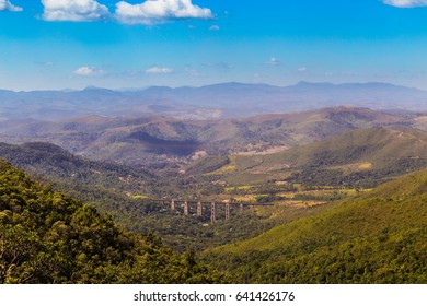 View of bridge between mountains