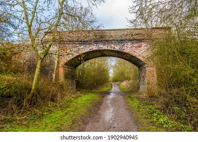 A view of a bridge over the Brampton Valley Way near Market Harborough, UK in Winter - Shutterstock ID 1902940945