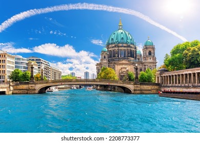 View of the bridges on the Spree and Attractive cathedral or Berliner Dom on Museum Island, Germany - Shutterstock ID 2208773377