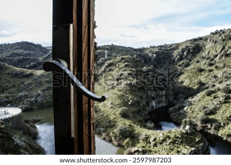 View from a broken and old window in the picturesque but abandoned village in northwestern Spain of Salto de Castro, Aliste, Zamora