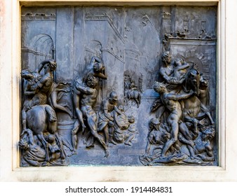 View at bronze plaque at statue The Rape of the Sabine Women by Giambologna at Loggia dei Lanzi in Florence, Italy
