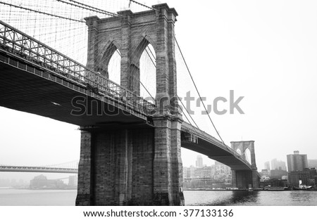 View Brooklyn Bridge with Foggy City in the Background