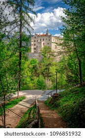 View Of Brunico Castle In Cloudy Day