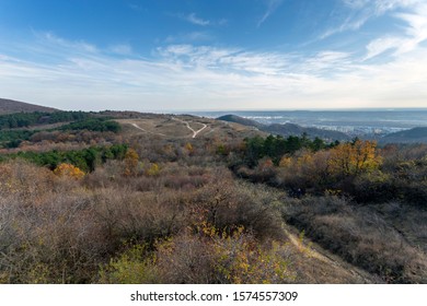 View of Buda mountains (Farkas-hegy) near Budaörs, Hungary on a sunny autumn day. - Shutterstock ID 1574557309