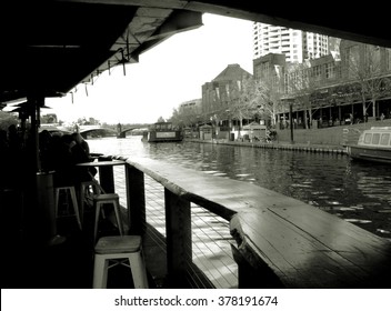 View Building From Bar Under Bridge In Melbourne City, Australia Near Flinders Street Train Station, Monochrome Style