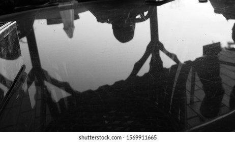 view of building and human reflections