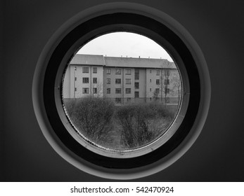 View of a building from a round window