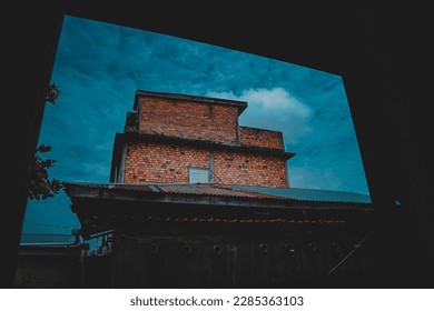 View of a building from a window.