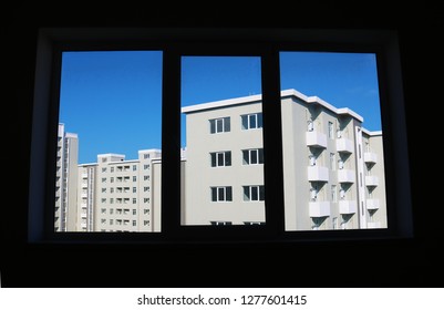 View of buildings through the window.
