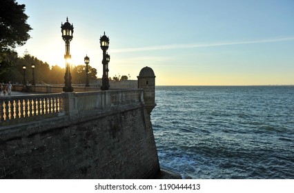 View of the bulwark of Candelaria and the bay of Cadiz at sunset, Andalusia, Spain - Shutterstock ID 1190444413