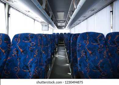 View Of Bus Interior With Comfortable Seats