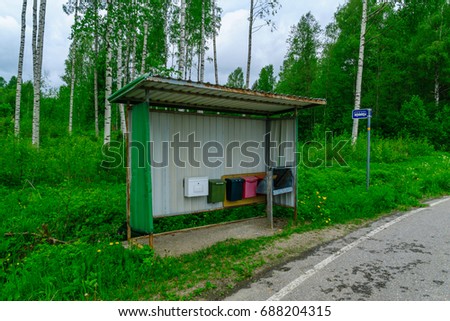 Similar – Image, Stock Photo Red bus stop shelter and yellow wastebasket in Hafnir, Iceland