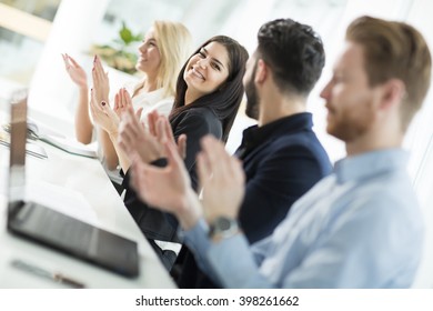 View Of The Business People Clapping In The Office