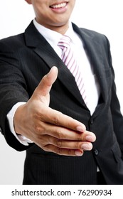 View Of Businessman Extending Hand To Shake