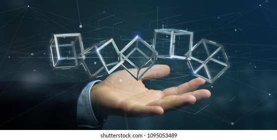 View of a Businessman holding a 3d rendering blockchain cube isolated on a background