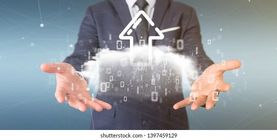 View of a Businessman holding a Binary cloud with upload internet arrow 3d rendering