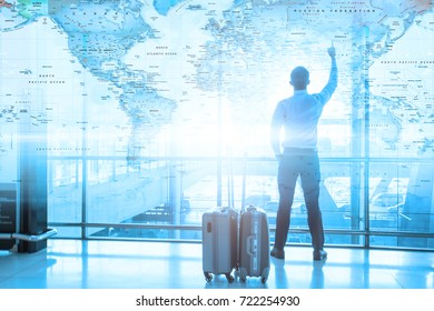 View Of Businessmen With Luggages  In Suits In International Airport, Mobility Concept And Aerospace Industry Flight Connections