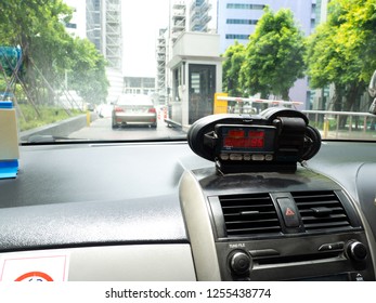 View from cab with meter display Time, Distance and Fare in dashboard interior
