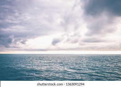 View From Cabin Balconies At The Rough Seas And Waves Off The Side Of Cruise Ship. Seascape Picture. The Sky With Clouds, Not Big Waves On The Sea Surface. Excitement At Sea