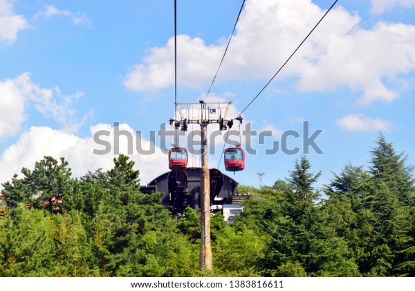 View of cable car transportation system for\
tourist traveling up and down to the mountain in summer or spring\
season at South Korea.