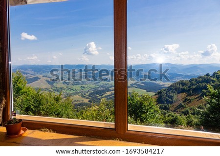 
view from a cafe in the mountains window view from a window in the mountains mountains beautiful sky open spaces tourism outdoor activities in the mountains