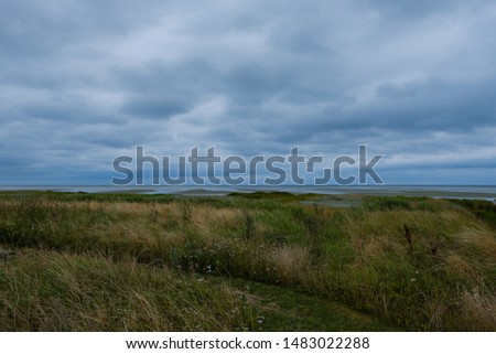 Similar – Lahnungen coastline barge