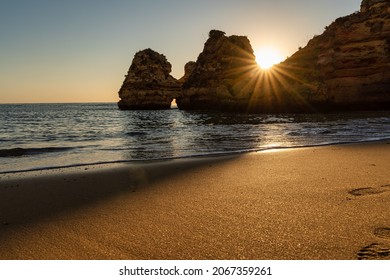 view of Camilo beach, at sunrise, in Lagos in the Algarve.
 - Powered by Shutterstock