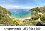 View to Cannelle beach, Spiaggia delle Cannelle, near Giglio Porto with view to mediterranean sea and beautiful blue bay at Isola del Giglio, island of the tuscan archipelago, Grosseto Tuscany Italy