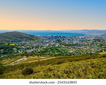 View of Cape Town city from Table Mountain, with Atlantic Ocean and clear blue sky, South Africa - Powered by Shutterstock