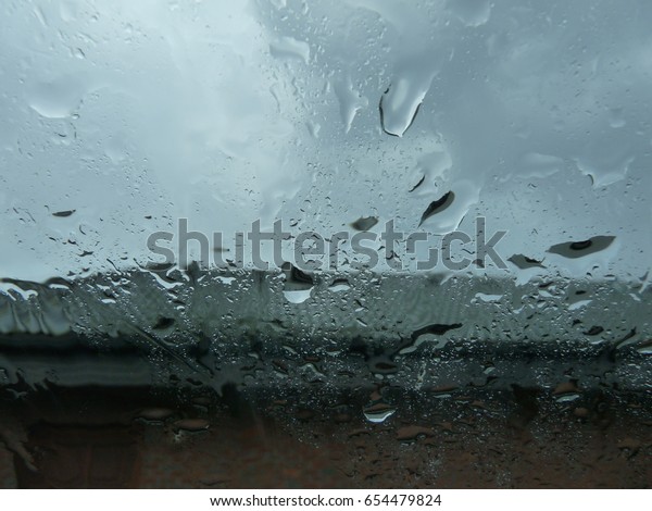 View from the car, it\
rains outside