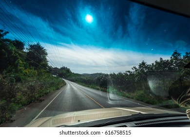 View Of A Car Running On The Road