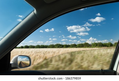 View From Car Window On Wheat Field