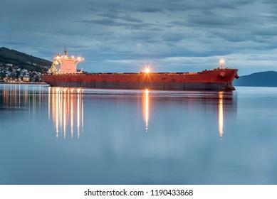 View Of A Cargo Ship Anchoring In A Port Of Narvik To Load Iron Ore, Norway