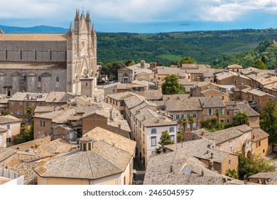 View of Cathedral over old town rooftops. Orvieto, Umbria, Italy - Powered by Shutterstock