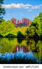 A view of Cathedral Rock reflecting off of Oak Creek just before a summer sunset.