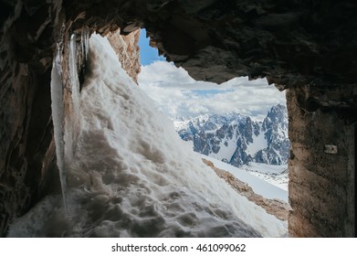 view from the cave of a mountain landscape