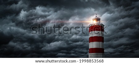 View from the center of the typhoon, hurricane, tornado, whirlwind on lighthouse and rain sky. Panoramic view of the stormy sky, lighthouse and dark clouds. Concept on the theme of weather, natural di