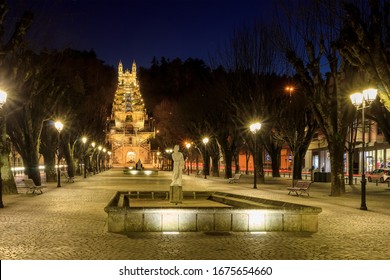View of the central alley of Lamego, Portugal, at night, with the Sanctuary of Nossa Senhora dos Remedios and its staircase in the background.