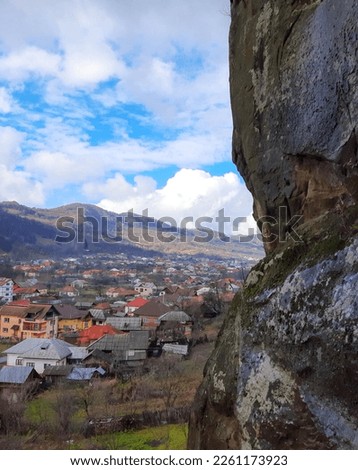 View of the central part of the small mountain village of Corbi on a cold November day in Romania.