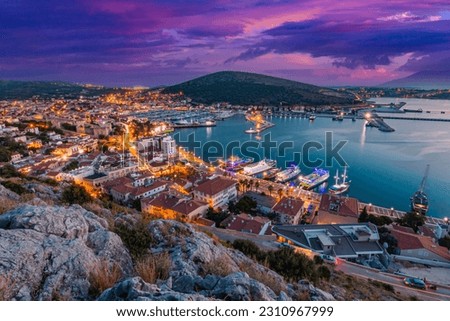 View of Cesme Marina, from Cesme Castle. Cesme is a coastal town and the administrative centre of the district of the same name in Turkey's westernmost end.