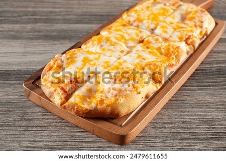 A view of a cheese flatbread.