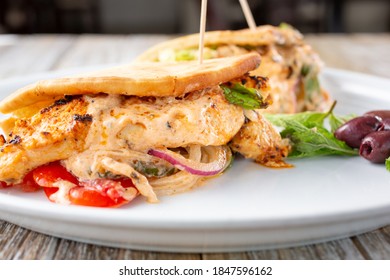 A View Of A Chicken Kabob Pita Wrap.