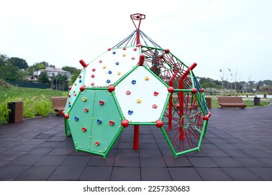 View of children's playground with climbing dome