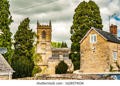 View of Chipping Norton Church past other buildings