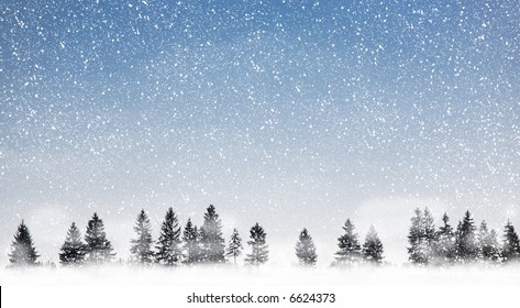 View of christmas trees through snow. Blue sky, snowflakes, trees and fog. - Powered by Shutterstock