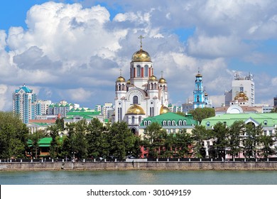 View Of The Church On Blood, The Church Of Christ's Ascension And The Patriarch's Metochion From The City Pond Of Yekaterinburg, Russia