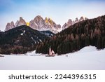 View of the church of Saint John (San Giovanni) and the Dolomites in the village of Saint Magdalena (Santa Maddalena), Trentino Alto Adige, South Tyrol, Italy. Dolomites Odle group