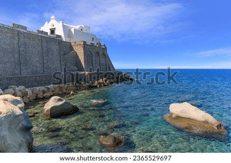 View of the Church of Soccorso perched high on its promontory at Forio d'Ischia in Ischia Island, Italy.