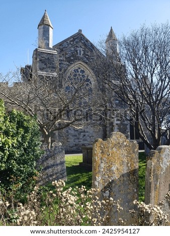 View of the Church of St. Mary (Rye, England) From Adjourning Graveyard on a Sunny Day