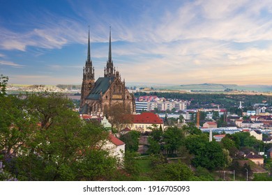 A view of the city of Brno in the Czech Republic in Europe from the viewpoint of Spilberk. The dominant feature of Brno is the Cathedral of St. Peter - Petrov. In the background is a blue sky.